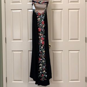 Black dress with floral detail on front and back